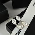 Chanel Silver-Tone Baroque Pearl Drop Earrings