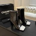 Chanel Black Croc-Embossed Ankle Boots with White Cap Toes