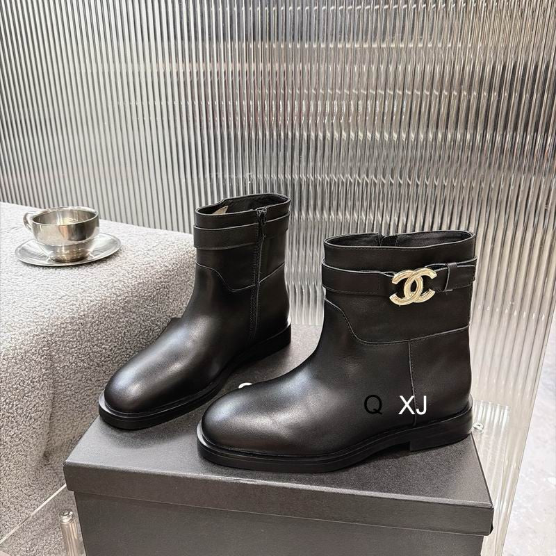 CHANEL Black Ankle Boots with Gold-Tone CC Detail