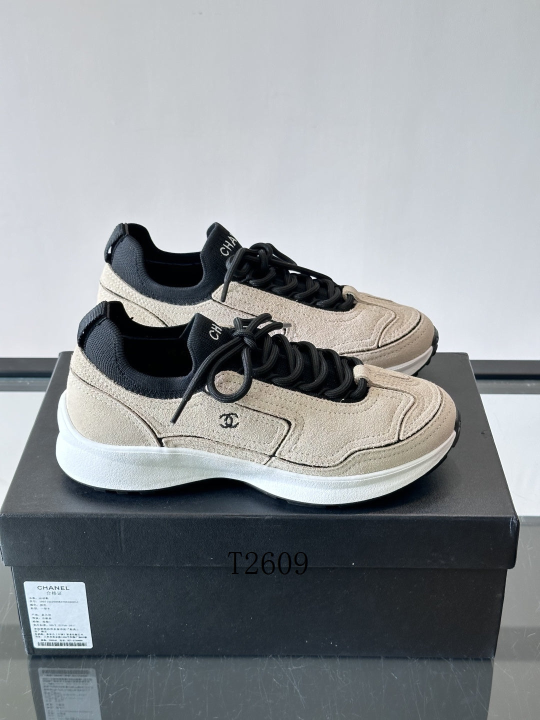 Chanel Beige Black Low-Top Sneakers
