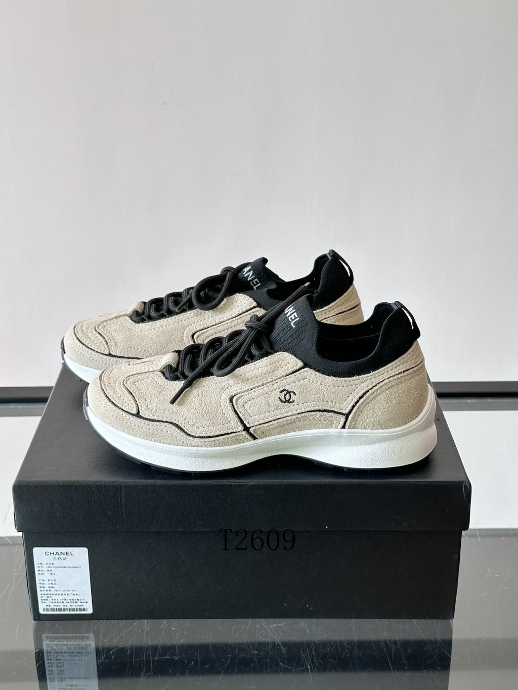 Chanel Beige Black Low-Top Sneakers
