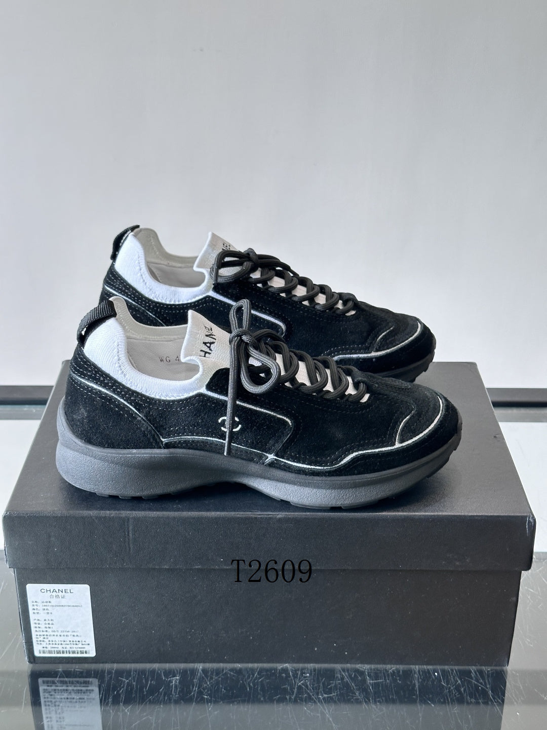 Chanel Black and White Low-Top Sneakers