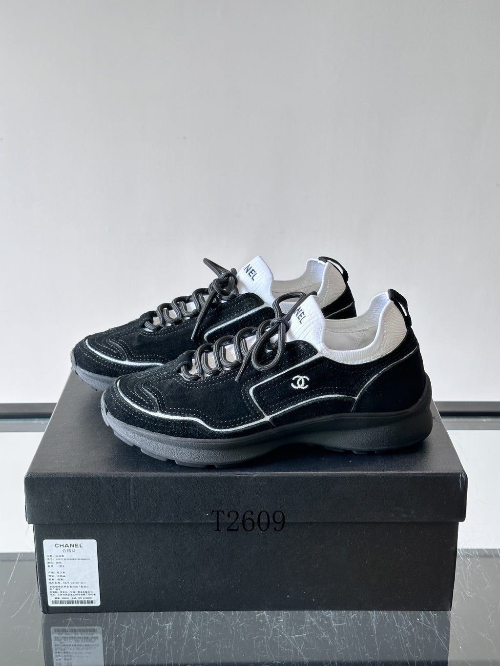 Chanel Black and White Low-Top Sneakers