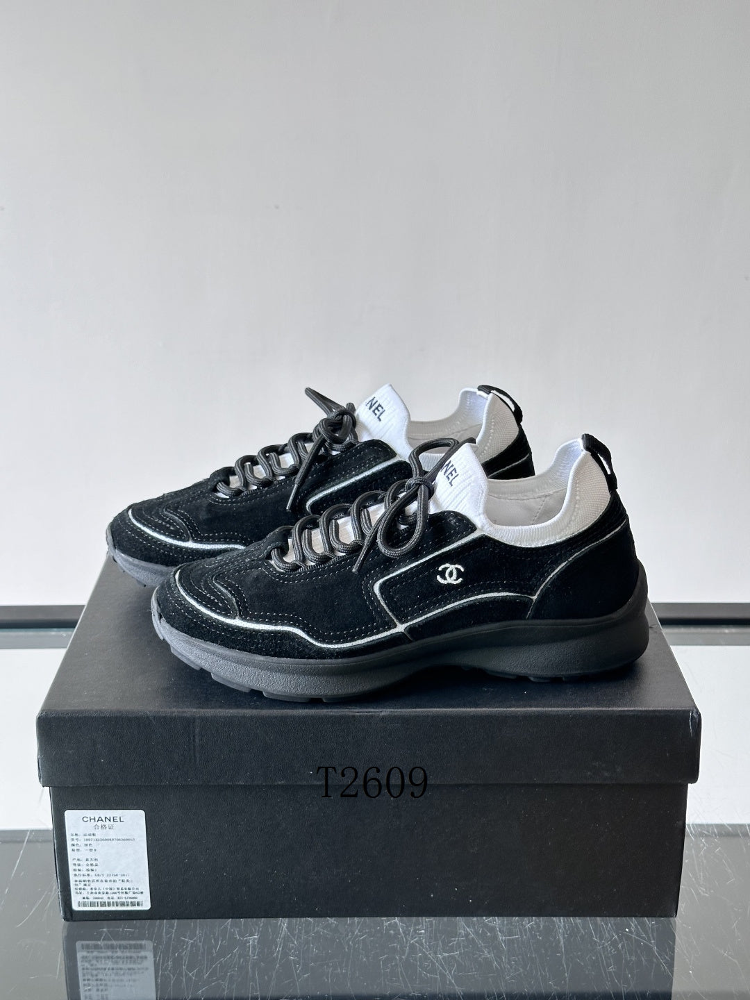 Chanel Black and White Low-Top Sneakers