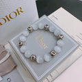 White Opalite Beaded Bracelet with Silver Logo Charms