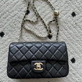 CHANEL 25S CLASSIC FLAP BAG MINI 20 IN BLACK LAMBSKIN WITH GOLD HARDWARE