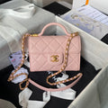CHANEL 25S FLAP BAG 18 CM IN LIGHT PINK GRAINED LAMBSKIN WITH TOP HANDLE